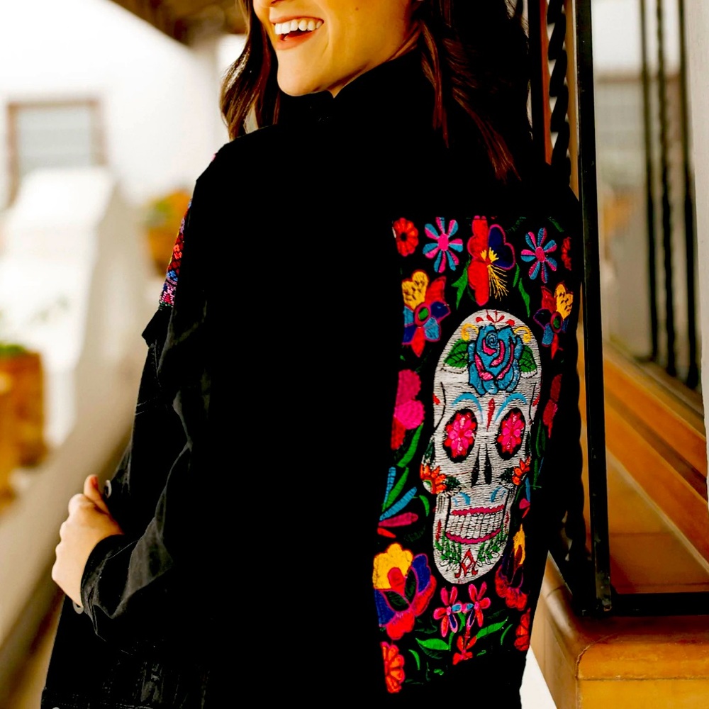Black Denim Jacket with an embroidered skull on the back Mexican flower designs